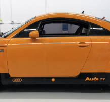 Audi Black Rims, Black Skirt, & Orange Lettering